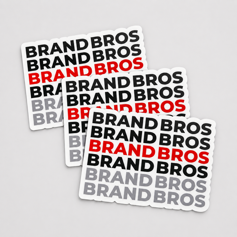 Custom Brand Bros Boise logo stickers with bold red, black, and gray branding on a clean gray background.