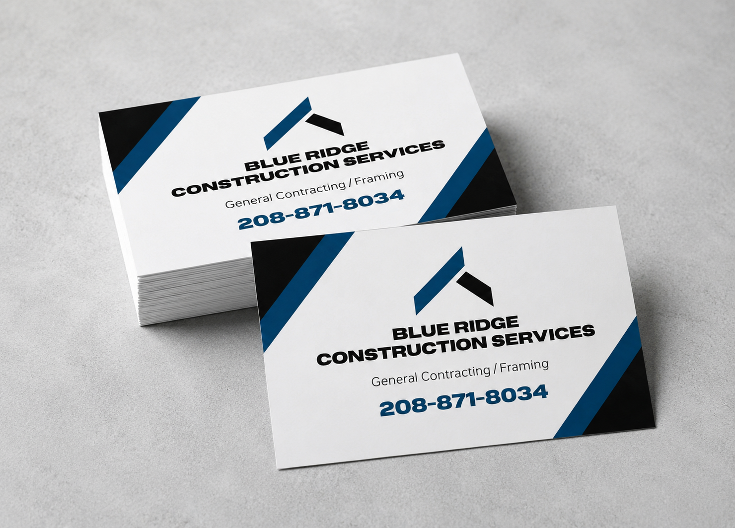 Custom business cards for Blue Ridge Construction Services displayed on a light gray background as an example of professional business card printing in Boise.
