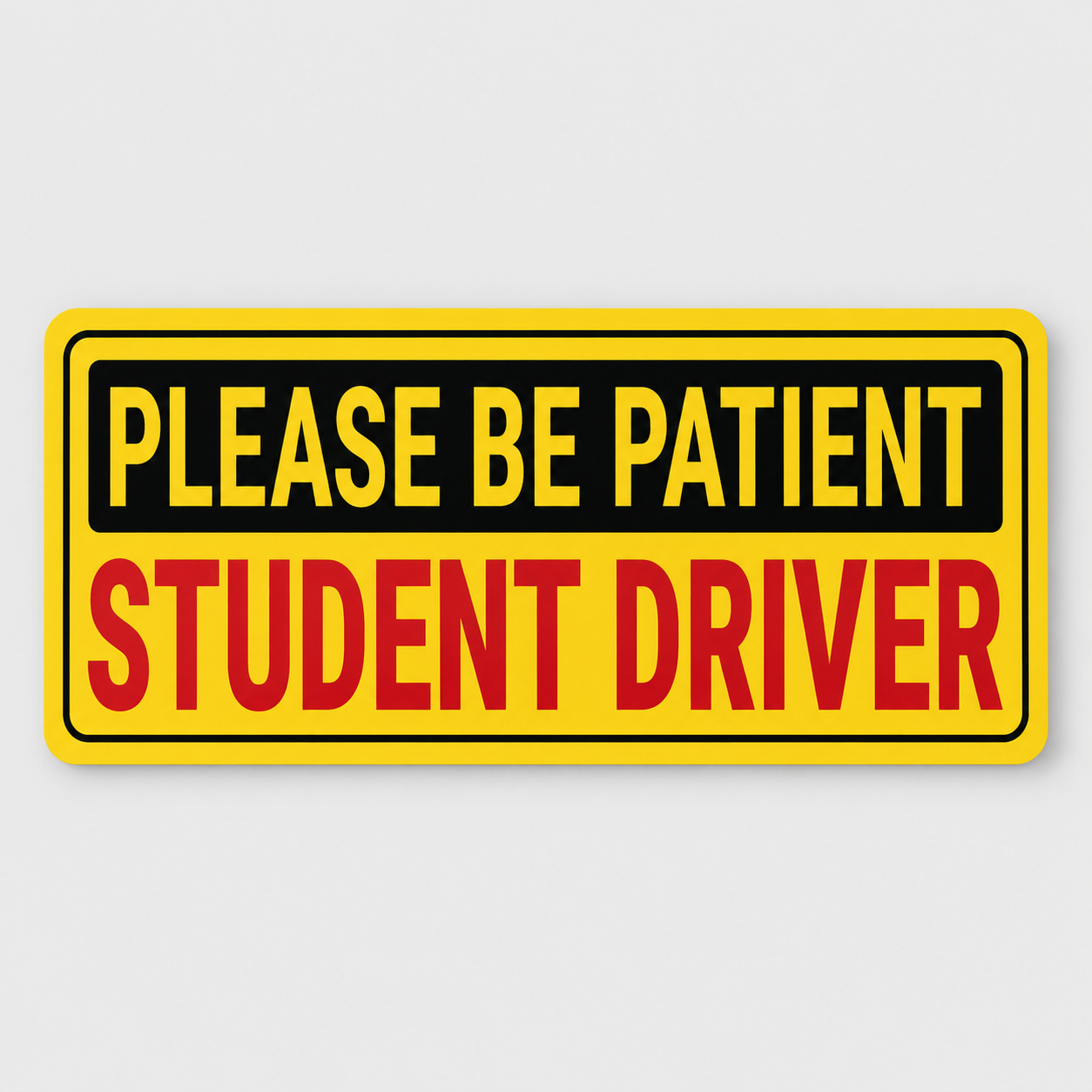 Custom student driver bumper sticker with yellow, black, and red design displayed on a light gray background as an example of bumper sticker printing in Boise.
